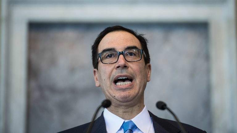 El Secretario del Tesoro de los Estados Unidos, Steven Mnuchin, celebra una conferencia de prensa en el Departamento del Tesoro el 13 de julio de 2017. (AFP Photo / Nicholas Kamm)