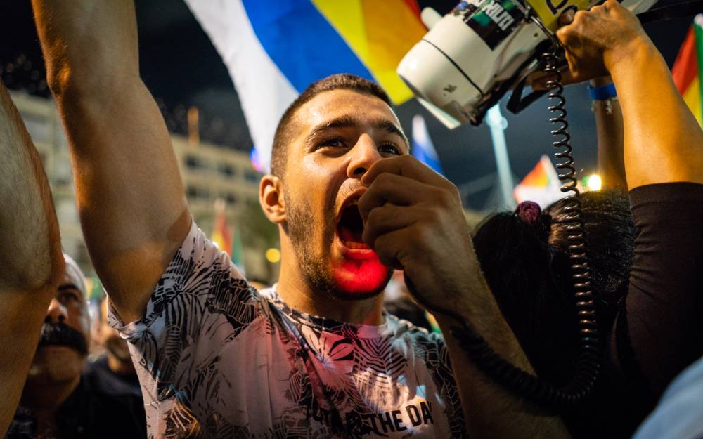 Los manifestantes drusos en una manifestación en Tel Aviv contra la ley estatal nacional, 4 de agosto de 2018. (Personal de Luke Tress / Times of Israel)