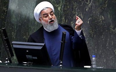 El presidente de Irán, Hassan Rouhani, habla en el Parlamento iraní en la capital, Teherán, el 28 de agosto de 2018. (AFP Photo / Atta Kenare)