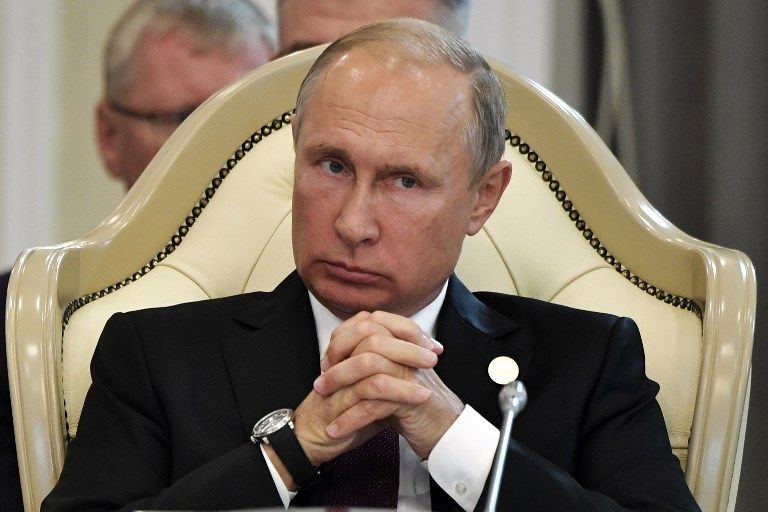 El presidente ruso, Vladimir Putin, asiste a la sesión plenaria de la V Cumbre del Caspio en Aktau el 12 de agosto de 2018. (AFP PHOTO / Sputnik / Alexey NIKOLSKY)
