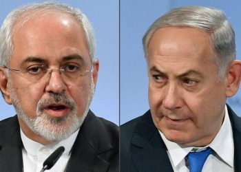 El Ministro de Relaciones Exteriores iraní Mohammad Javad Zarif (L) y el Primer Ministro israelí Benjamin Netanyahu (R) asisten a la Conferencia de Seguridad de Munich el 18 de febrero de 2018 en Munich, Alemania. (AFP PHOTO / Thomas KIENZLE)