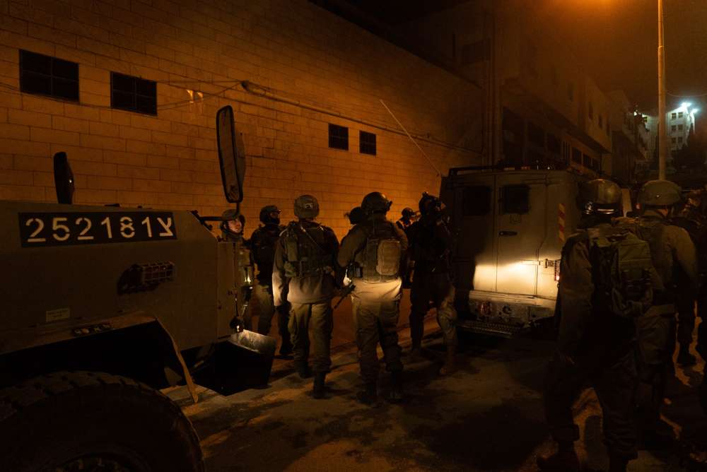 Las tropas israelíes miden la casa de Hebrón de un hombre palestino sospechoso de asesinar a Ori Ansbacher en Jerusaelm, el 10 de febrero de 2019. (Fuerzas de Defensa de Israel)