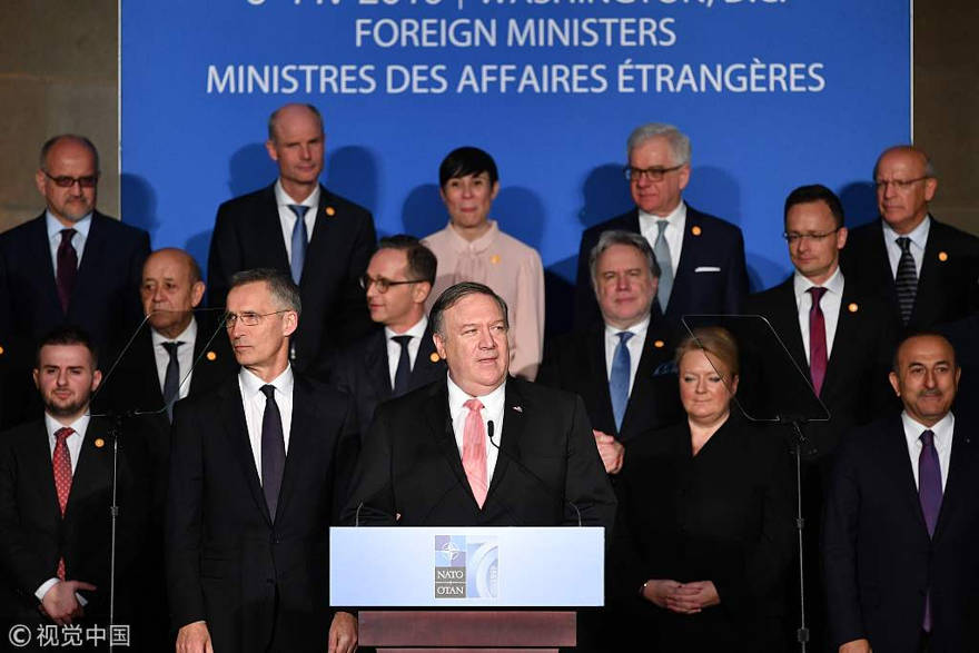 El Secretario de Estado de los EE. UU., Mike Pompeo (C), habla en una recepción que celebra el 70 aniversario de la OTAN en el auditorio Andrew W. Mellon en Washington, DC, el 3 de abril de 2019. / Foto de VCG.