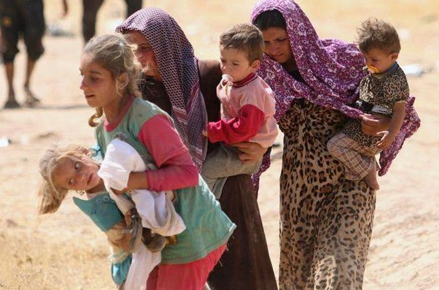 Mujeres yazidi que llevan a sus hijos el 1 de enero de 2015 (Cortesía de Nareen Shammo)