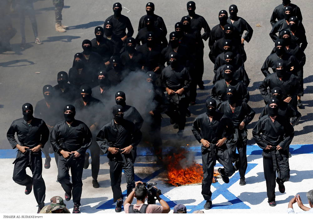 Los chiítas iraquíes marchan durante un desfile con motivo del Día de Al-Quds en Bagdad el 31 de mayo de 2019. Thayer al-Sudani/Reuters