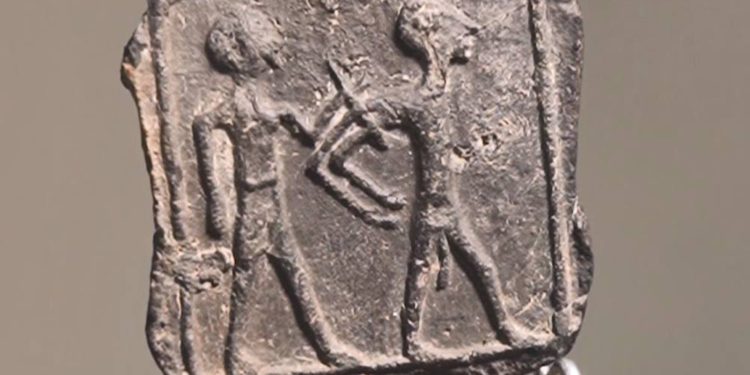 Sello de hace 3.500 años que representa la lucha de poderes hallado cerca de Gaza