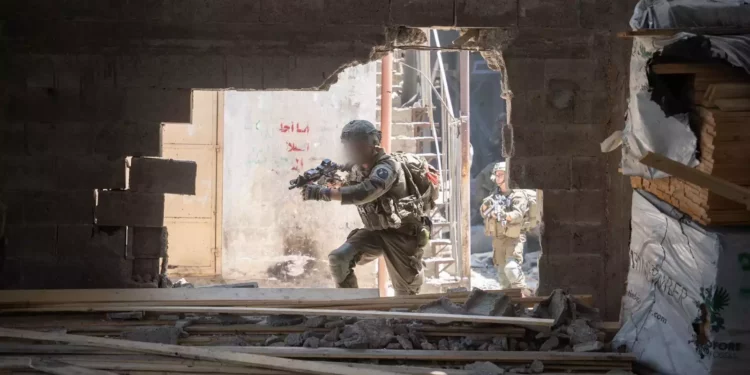 Soldiers of the Paratroopers Brigade operate in northern Gaza's Jabaliya, in an image cleared for publication on May 26, 2024. (Israel Defense Forces)