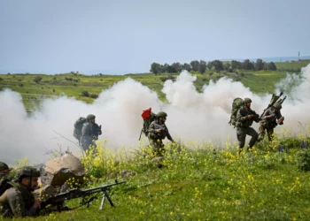 Israeli reserve soldiers train with their unit in urban warfare in northern Golan Heights, on March 27, 2024. (Michael Giladi/Flash90)