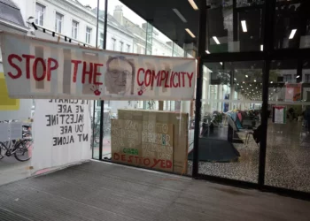 Posters and banners line the entrance to an encampment, set up by pro-Palestinian students and activists at Ghent University, in Ghent, Belgium, May 16, 2024. (AP Photo/Virginia Mayo)